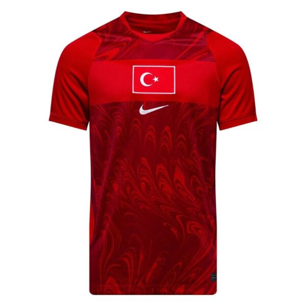 Red athletic jersey with a white-outlined rectangle containing the Turkish flag (crescent and star) on the chest and a white Nike swoosh underneath.