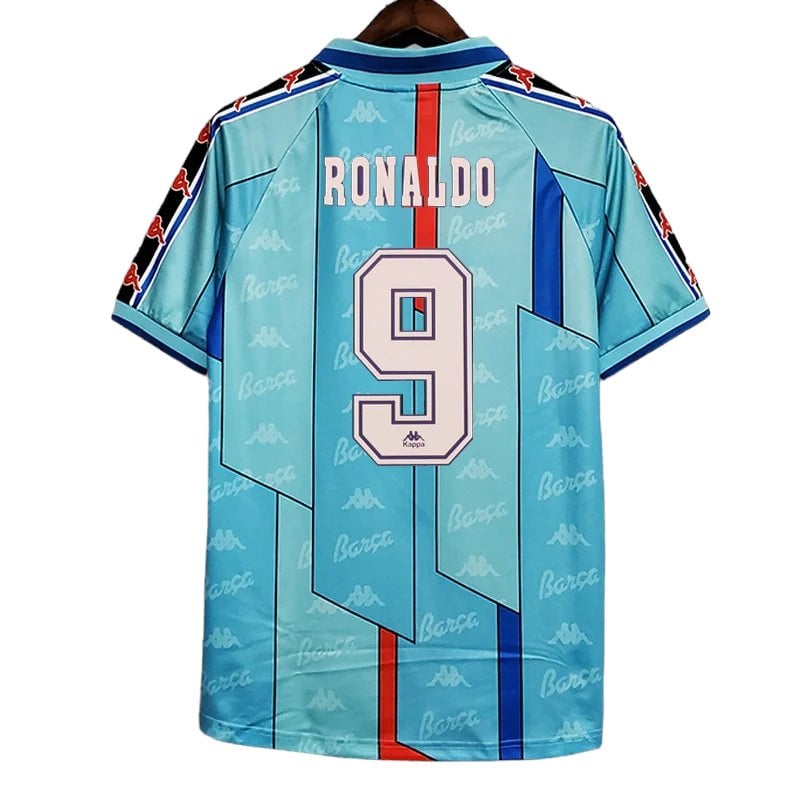 barcelona-away-classic-199697-jersey-with-ronldo-9-200134 | UAE SPORT STORE Back of a mint blue football jersey with 'RONALDO' and the large number 9, Kappa branding, red and dark blue vertical accents.