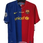 FC Barcelona soccer jersey split blue and red, featuring UNICEF logo, Nike swoosh, and Champions League patch on the sleeve.