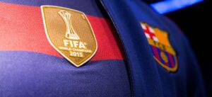barcelona-classic-201516-final-with-messi-10-badges-jersey-315184 | UAE SPORT STORE Close-up of a blue-and-red FC Barcelona jersey with the FIFA World Champions 2015 patch visible