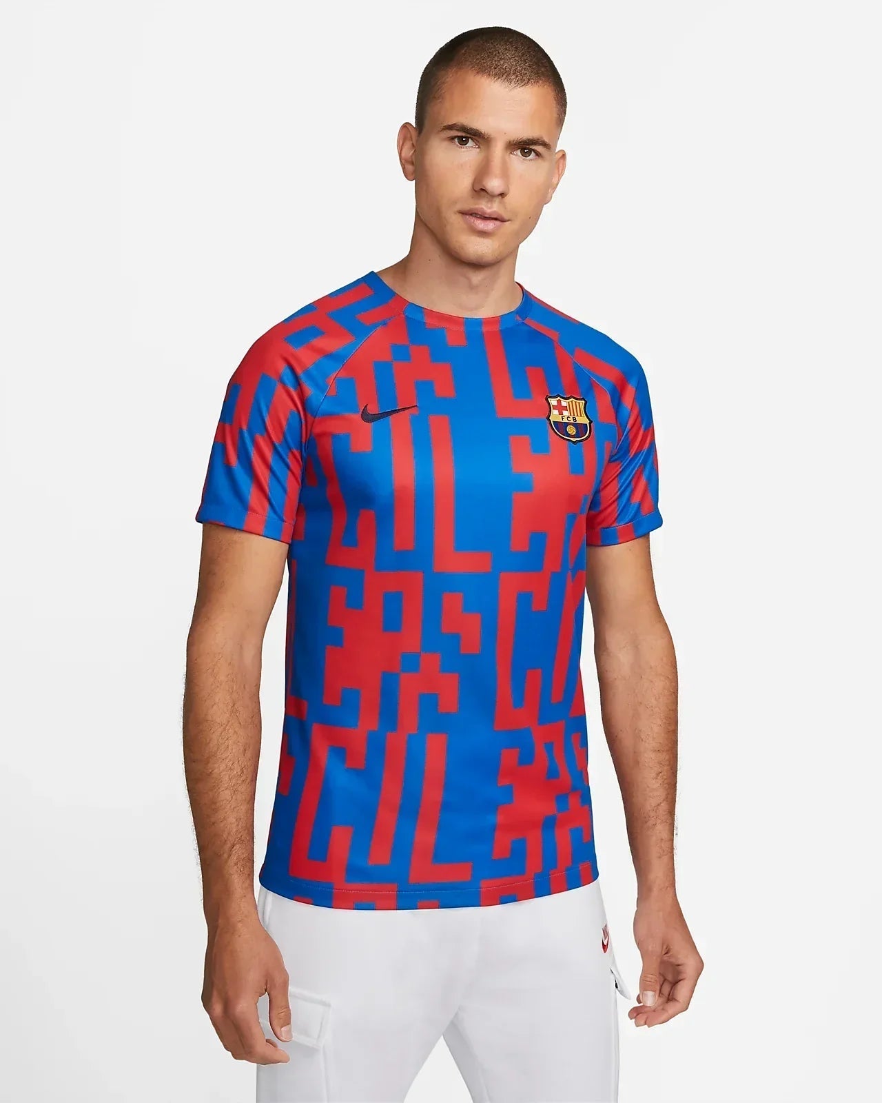 barcelona-pre-match-jersey-202223-419925 | UAE SPORT STORE FC Barcelona football jersey in blue and red with a bold geometric pattern and the club crest on the chest.