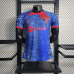 barcelona-special-edition-jersey-202324-500884 | UAE SPORT STORE Blue FC Barcelona soccer jersey on a mannequin in a store, featuring the red Spotify logo across the chest.