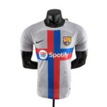 Mannequin wearing a Barcelona football jersey with Spotify sponsor and blue-red vertical stripe on the chest.