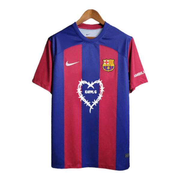 FC Barcelona soccer jersey on a wooden hanger with blue and red vertical stripes, Nike logo, and team crest on the chest.