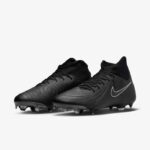 Pair of black Nike soccer cleats with stitched detailing and a white Nike swoosh on the side.