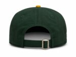 Classic green and gold sports cap with adjustable strap.