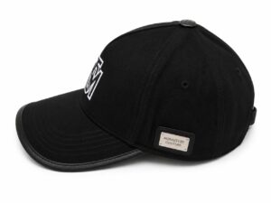 Stylish black monogram cap with embroidered logo and adjustable strap. Perfect for sports and casual.