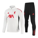Liverpool FC white training jersey with red AXA sponsor and crest, paired with black pants featuring red adidas logos.