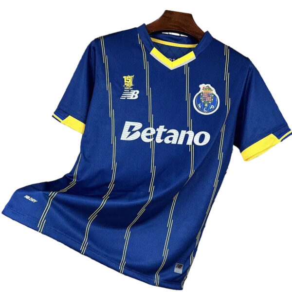 Blue soccer jersey with yellow trim and thin vertical stripes, featuring Betano logo and Porto crest on the chest.