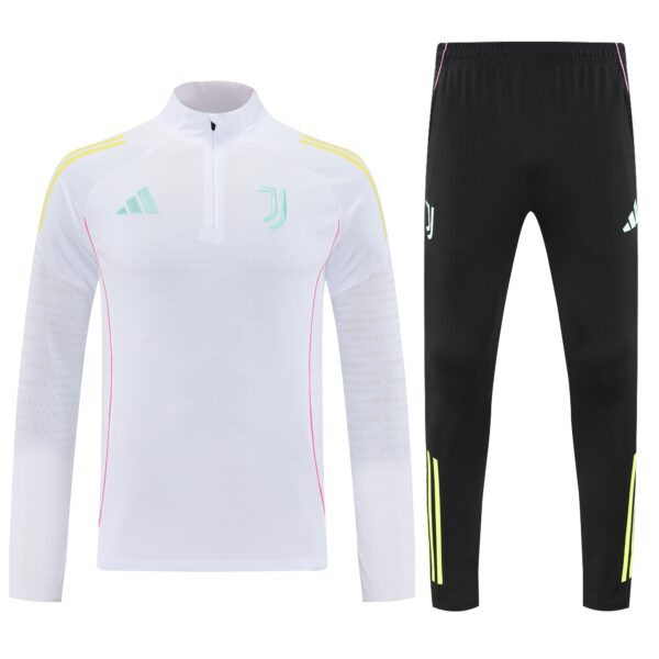White Juventus training top with pastel crest and yellow shoulder stripes, paired with black pants with neon yellow trim.