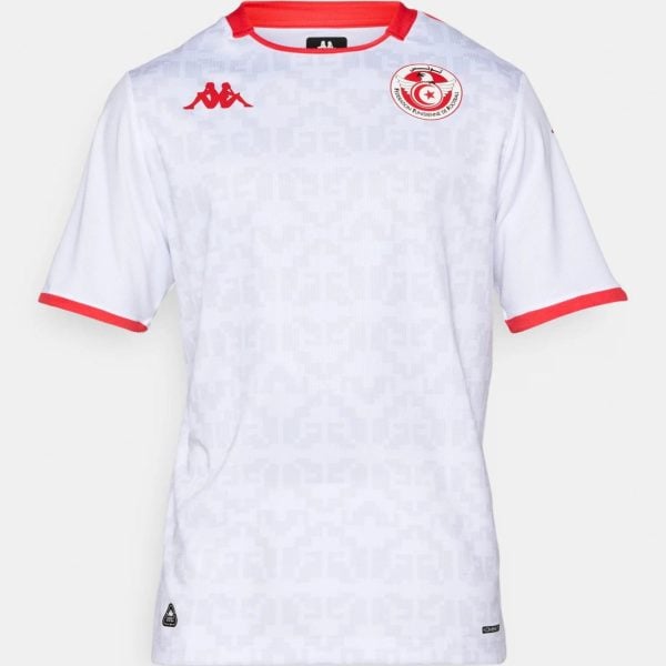White football/soccer jersey with red collar and sleeve trims, featuring a Tunisian Football Federation crest on the chest and a red Kappa logo on the opposite side.