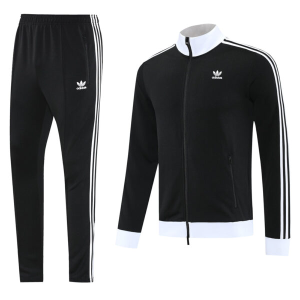 Adidas black track suit with white stripes on sleeves and down pant legs, shown with a matching black jacket featuring a white collar and cuffs and small Adidas logo.