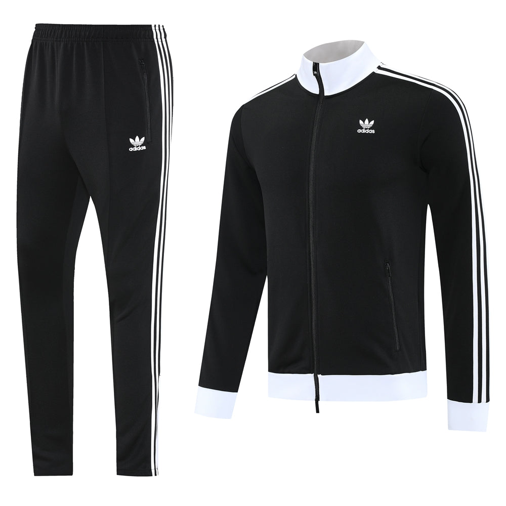 bf4c002b Adidas black track suit with white stripes on sleeves and down pant legs, shown with a matching black jacket featuring a white collar and cuffs and small Adidas logo.