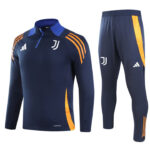 Dark blue Juventus training top and pants set with orange accents and white logos, shown side by side.