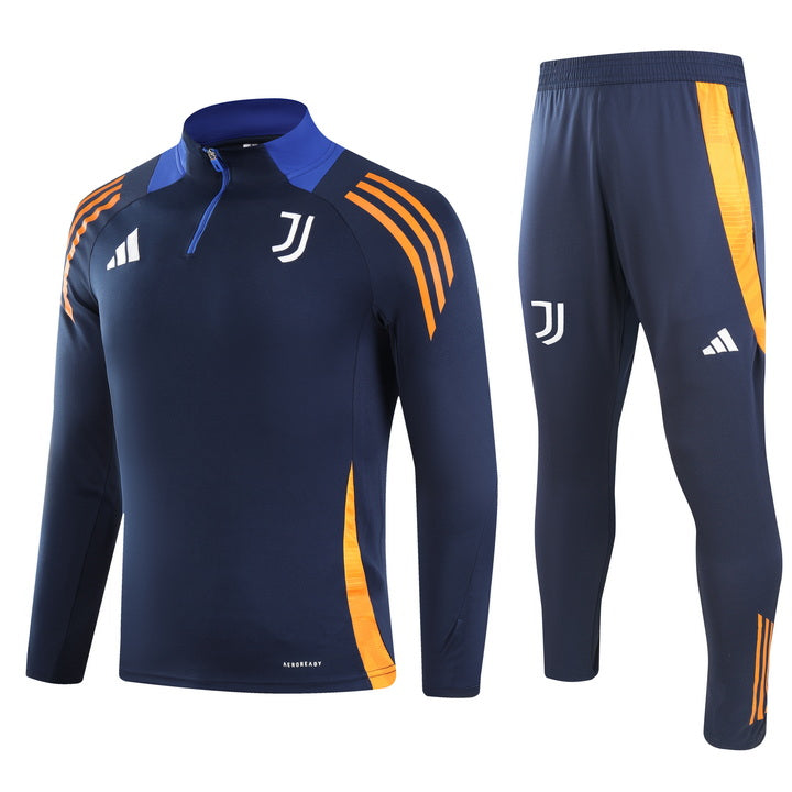 bf66a243 Dark blue Juventus training top and pants set with orange accents and white logos, shown side by side.