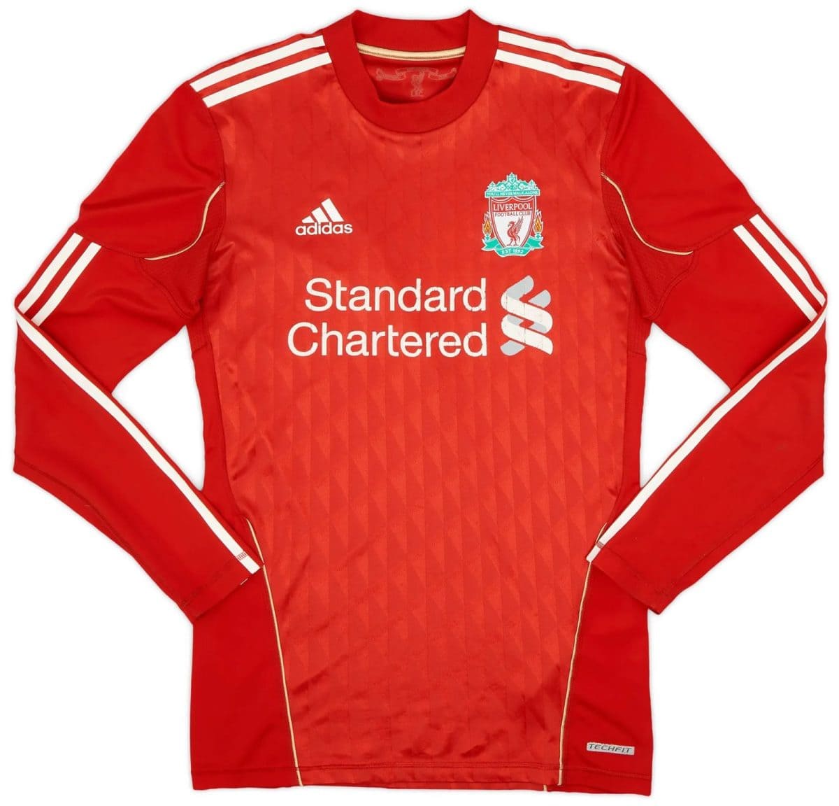 Red Liverpool FC home jersey with white Adidas logo and crest, sponsor text 'Standard Chartered' across the chest (front view).