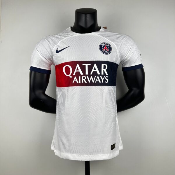 Mannequin wearing a white Paris Saint-Germain jersey with Qatar Airways sponsor, Nike swoosh, and PSG crest on the chest.