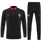 Black Portugal national team training tracksuit with red accents: zip-neck top and matching pants, featuring the Puma logo and crest.