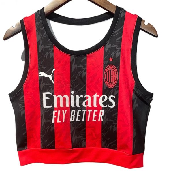 AC Milan red-and-black striped cropped jersey on a hanger, featuring the Emirates Fly Better sponsor and the club crest.