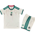 White Algeria national team football jersey and shorts set with green vertical trim and crest on chest and shorts logo area