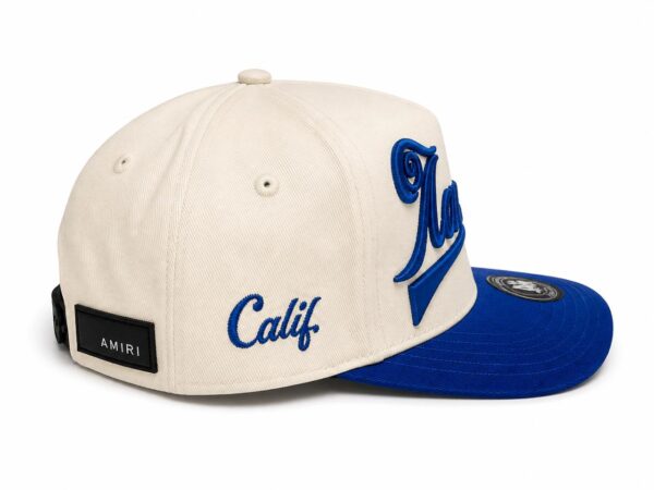 Stylish vintage script baseball cap with "Calif" embroidery and blue brim. Perfect for casual sports.