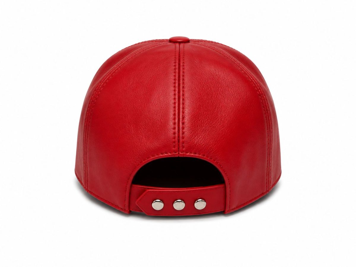 Back view of a red leather baseball cap with an adjustable strap and three metal snaps.