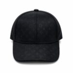 c55cc2ef-b51a-495e-b4f4-ff4c161ab9ba | UAE SPORT STORE Black baseball cap with a subtle all-over Louis Vuitton monogram pattern, front view with curved brim.