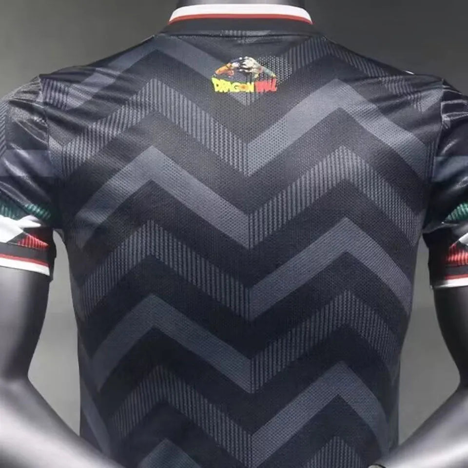 c9406c48ca4c24f7 | UAE SPORT STORE Back view of a navy chevron-pattern sports jersey with dark zigzag stripes; small colorful Dragon Ball logo appears near the upper back.