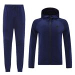 Navy blue Nike tracksuit: zip-up hooded jacket with jogger pants shown together, Nike logos on chest and thigh while displayed from the front.