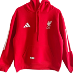 Red hoodie with white Adidas logo and LFC crest, white stripes on sleeves, front pocket, and drawstrings.
