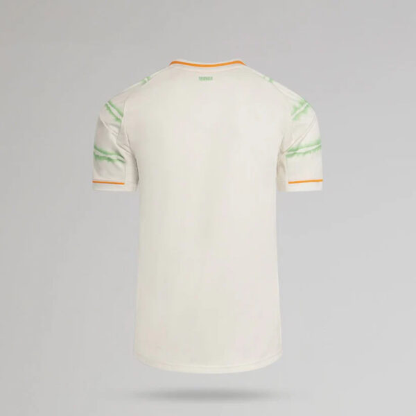 White soccer jersey shown from the back, with orange trim on the collar and sleeves and pale green accents on the shoulders