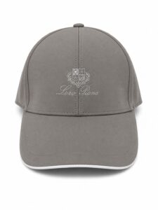 cfdc989e-11a5-4cae-9d3f-62e23beee48b | UAE SPORT STORE Grey baseball cap with an embroidered crest and 'Loro Piana' script on the front.