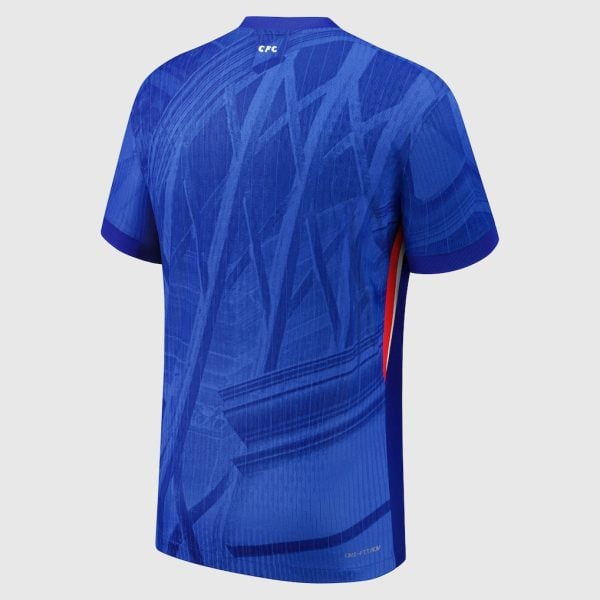Back view of a blue athletic jersey with an abstract dark-blue pattern and a red side panel.