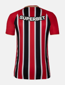 Back view of a red, black, and white striped soccer jersey with the 'SUPERBET' logo across the shoulders.