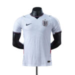 White England national team football jersey with crest on the chest and Nike logo, displayed on a mannequin press.