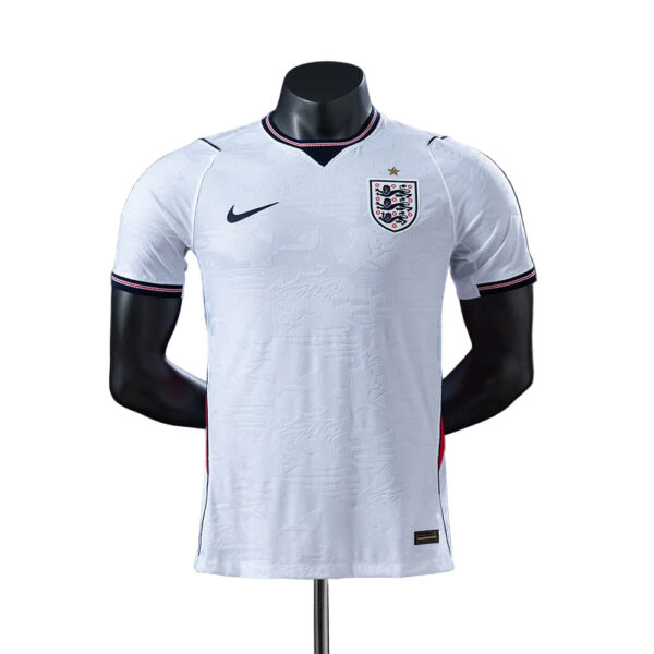 White England national team football jersey with crest on the chest and Nike logo, displayed on a mannequin press.