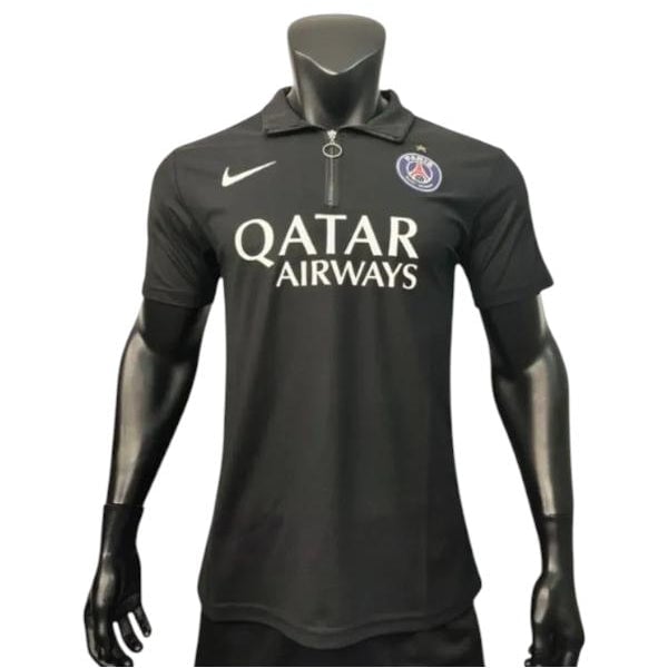 Black PSG football jersey featuring Qatar Airways sponsor and Nike swoosh on a display mannequin, front view with team crest on chest.