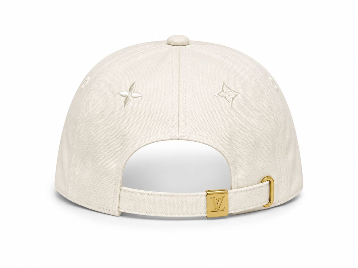 Back view of a beige Louis Vuitton cap with an adjustable strap and gold-tone buckle featuring the LV logo.