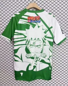 Back view of a green and white Naruto Shippuden T-shirt with a large Naruto graphic and logo on the back edge of the collar.