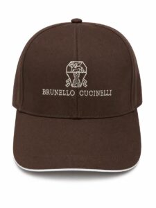 Brown baseball cap with white embroidered logo and 'BRUNELLO CUCINELLI' text on the front panel.