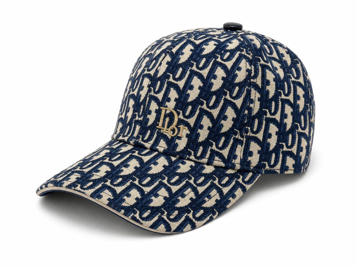 Blue and beige Dior monogram baseball cap with curved brim and gold-tone 'Dior' logo front center.