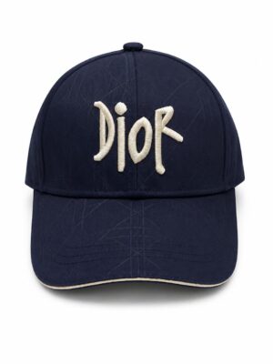 Navy baseball cap with beige Dior logo stitched on the front