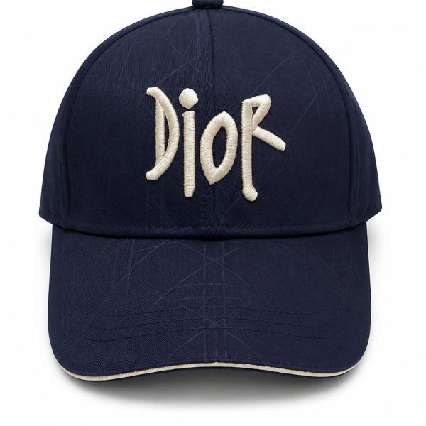 Navy baseball cap with white Dior embroidery on the front.