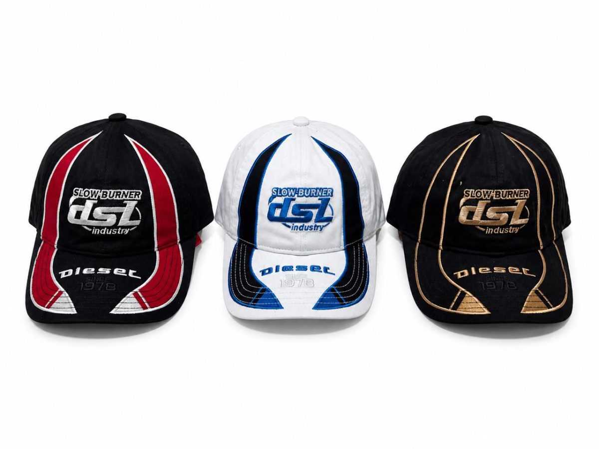Row of three baseball caps: left black with red and white piping, center white with blue accents, right black with gold piping, all featuring Diesel branding and '1978' text.