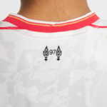 Back view of white sports jersey with red collar; centered black '97' between two flame icons.