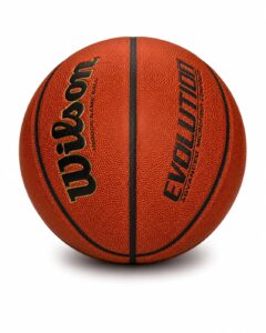 Orange Wilson basketball with black seams on a white background, showing its pebbled surface.