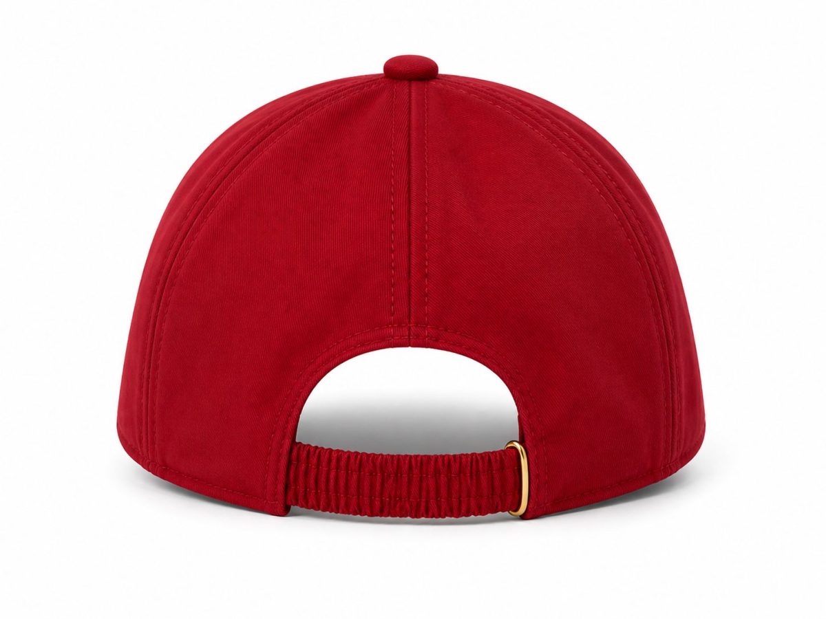 Back view of a red baseball cap with an adjustable strap and small gold buckle at the rear.