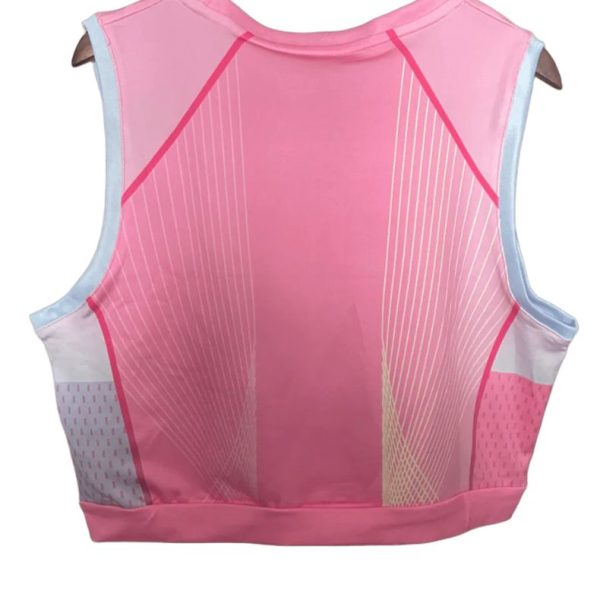 Pink sleeveless athletic vest on a hanger with light blue trim and white line graphics on the back, forming a geometric pattern.