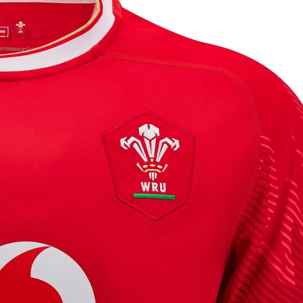 d9ea579fe7672b76074e27142125c33d | UAE SPORT STORE Red rugby jersey featuring the Welsh Rugby Union (WRU) crest on the chest.