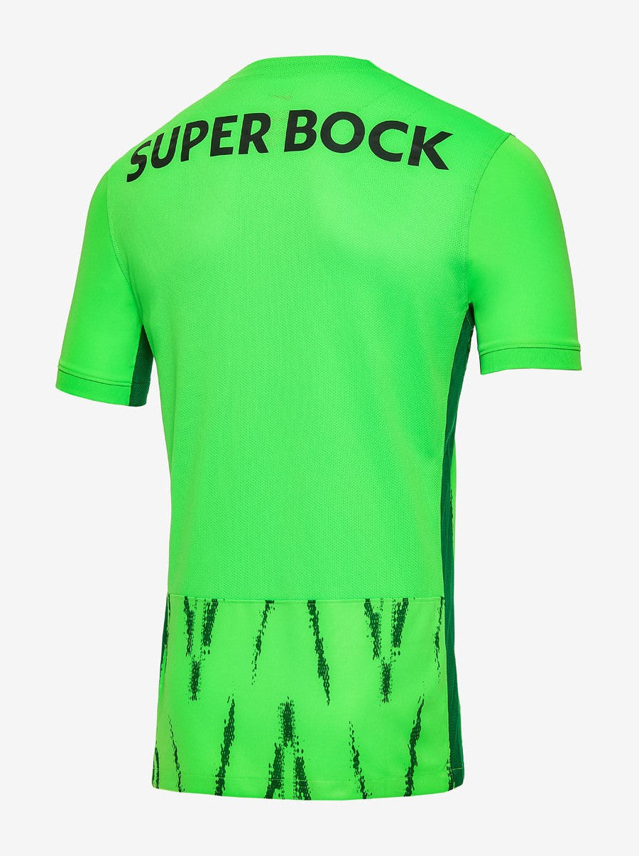 dEyfOcxHK4phlPk | UAE SPORT STORE Back view of a bright green sports jersey with black 'SUPER BOCK' lettering across the shoulders and a black striped pattern at the hem.